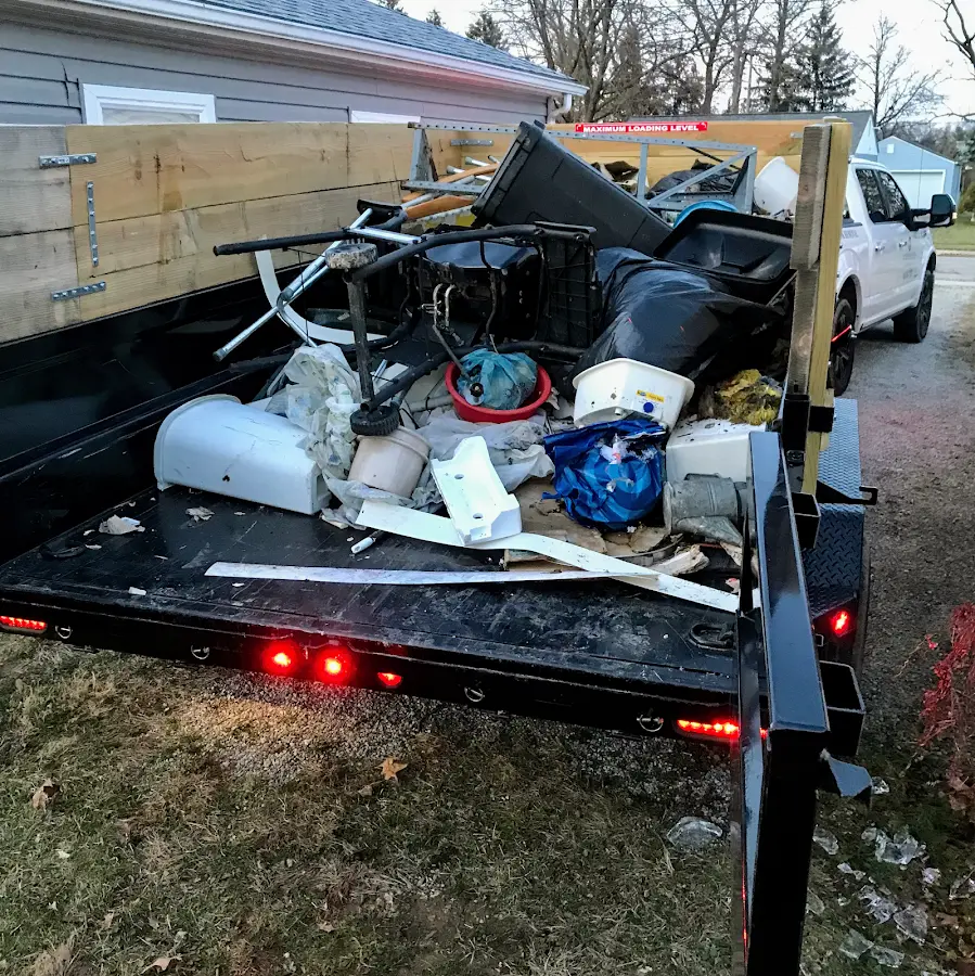 Roll-off dumpster delivered to a residential driveway in Stanton